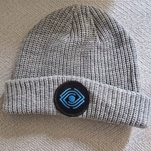 Gray Knit Beanie with Blue Eye Patch